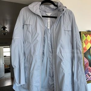 Brand new without tags. Never worn. Lululemon rain jacket with hood. Adorable!